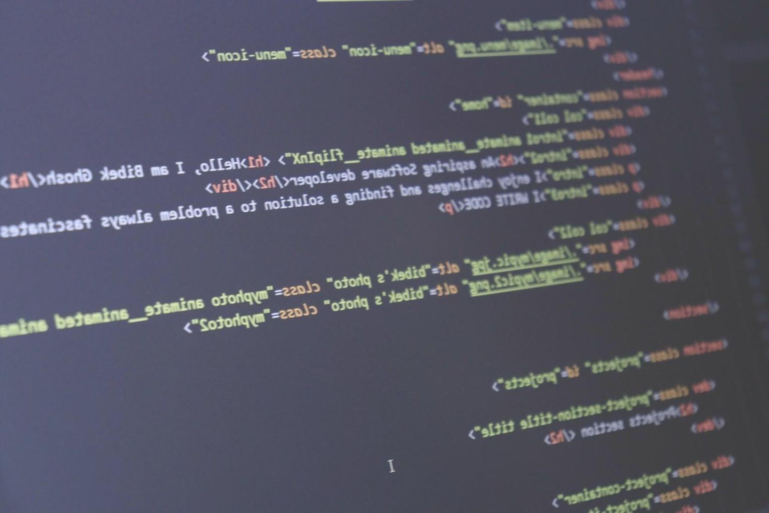 Students participating in remote JavaScript programming session showing collaborative learning environment